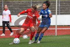 2. Fußball-Liga - Frauen - Saison 2022/2023 - FC Ingolstadt 04 - SC Sand - Ebert Lisa (Nr.10 - FC Ingolstadt 04 ) - Bohnen Amelie blau SC Sand - Foto: Meyer Jürgen