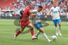 3. Liga; FC Ingolstadt 04 - FC Hansa Rostock; Zweikampf Kampf um den Ball Mattis Hoppe (2, FCI) Fatkic Kenan (4 HR)
