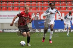 3.Liga - Saison 2022/2023 - FC Ingolstadt 04 -  - FC Freiburg II - Tobias Bech (Nr.11 - FCI) - Jordy Makendo (Nr.4 - SC Freiburg II) - Foto: Meyer Jürgen