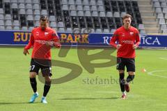 3.Liga - Saison 2022/2023 - SC Freiburg II - FC Ingolstadt 04 - Pascal Testroet (Nr.37 - FCI) - Calvin Brackelmann (Nr.17 - FCI) -  - Foto: Meyer Jürgen