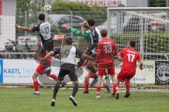 Kreisliga- Saison 2024/25- TSV Kösching - TSV Ober./Unterh.stadt-  - Manuell Hunner weiss Ober-/Unterh.stadt  - Michael Zimmermann rot Kösching Torwart - Foto: Meyer Jürgen