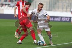 3. Liga - Saison 2023/24 - Rot-Weiss Essen - FC Ingolstadt 04 -  - Sandro Plechaty (#21 Essen) - David Kopacz (Nr.29 - FCI) - Foto: Meyer Jürgen