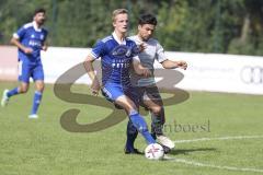 Kreisliga - Saison 2023/2024 - TSV Ober/Unterh.stadt- TSV Mümchsmünster - Simon Bellinghausen blau Oberhstadt - Andre Bräuning grau M.Münster - Foto: Meyer Jürgen