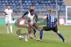 3. Liga; SV Waldhof Mannheim - FC Ingolstadt 04 - Zweikampf Kampf um den Ball Bryang Kayo (48, FCI) Wagner Fridolin (8 SVWM)
