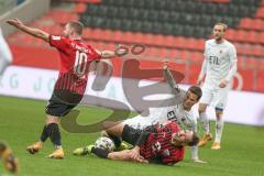 3. Fußball-Liga - Saison 2020/2021 - FC Ingolstadt 04 - FC Viktoria Köln - Tobias Schröck (#21,FCI)  wird gefoult - Foto: Meyer Jürgen