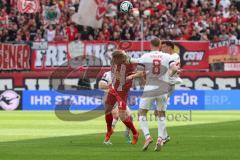 3. Liga - Saison 2023/24 - Rot-Weiss Essen - FC Ingolstadt 04 -  - Lukas Fröde (Nr.34 - FCI) - Cedric Harenbrock (#8 Essen) - Foto: Meyer Jürgen