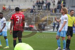 3.Liga - Saison 2022/2023 - TSV 1860 München - FC Ingolstadt 04 - Justin Butler (Nr.31 - FCI) bekommt die gelbe Karte - Foto: Meyer Jürgen