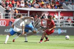 3. Liga; FC Ingolstadt 04 - FC Hansa Rostock; Zweikampf Kampf um den Ball Marcel Costly (22, FCI) Schuster Marco (5 HR) Fatkic Kenan (4 HR)
