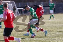 2024_2_17 - Saison 2023/24 - AUDI-Schanzer Amateur Cup - FC Gerolfing - TV 1861 Ingolstadt - Halbfinale 2 - Julien Bajer grün Gerolfing - Stefan Funk rot 1861 Ing. - Foto: Meyer Jürgen