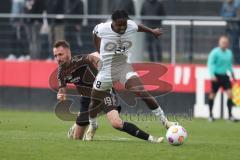 3. Liga - Saison 2023/24 - Testspiel - 1. FC Nürnberg - FC Ingolstadt 04 - Hübner Florian (#19 Nürnberg) - Bryang Kayo (Nr.48 - FCI) - Foto: Meyer Jürgen