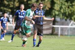Kreisklasse - Saison 2025/26- SV Haunwöhr - FC Geisenfeld  - Kilian Kellermann grün Geisenfeld - Mathias Ott blau Haunwöhr - Foto: Meyer Jürgen
