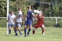 Kreisliga - Saison 2023/2024 - TSV Ober/Unterh.stadt- TSV Mümchsmünster - Simon Bellinghausen blau Oberhstadt - Michael Baumgartner Torwart M.Münster - Foto: Meyer Jürgen