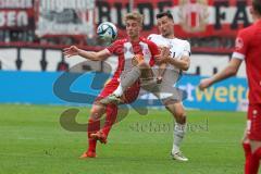 3. Liga - Saison 2023/24 - Rot-Weiss Essen - FC Ingolstadt 04 -  - Lukas Fröde (Nr.34 - FCI) - Cedric Harenbrock (#8 Essen) - Foto: Meyer Jürgen