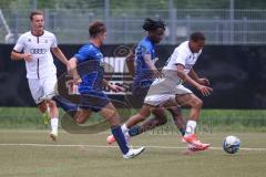 Freundschaftsspiel - Saison 2024/25 - FC Ingolstadt 04 II - TSV Rain/Lech  - Micah Ham (Nr.25 - FCI U21) - Sodji Marc blau Rain/Lech - Foto: Meyer Jürgen