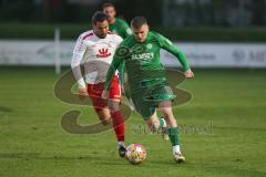 Landesliga - Saison 2024/25 - SV Manching - FC Gundelfingen - Sebastian Graßl (Nr.10 - SV Manching) - Elias Weichler weiss Gundelfingen - Foto: Meyer Jürgen