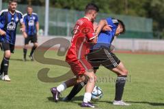 Testspiel - Bezirksliga - Saison 2025/26 - FC Fatih Ingolstadt - TSV Burgheim - Aaron Toski rot Fatih - Nick Vogel blau Burgheim  - Foto: Meyer Jürgen