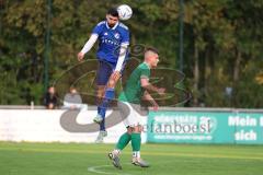 Kreisliga - Saison 2023/2024 - FC Gerolfing - TSV Ober/Unterhaunstadt -  Emre Erdogan blau Oberhaunstadt - Raymond Kreizer grün Gerolfing - Foto: Meyer Jürgen