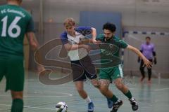 Hallenturnier Ingolstadt Nord - Saison 2024/25 - FC Geisenfeld - TSV Etting - Furkan Bayraktar grün Geisenfeld - Juri Braun weisss Etting - Foto: Meyer Jürgen