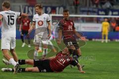 3. Liga - Saison 2023/24 - FC Ingolstadt 04 - Waldhof Mannheim - Marcel Costly (Nr.22 - FCI) - Malte Karbstein (#15 Mannheim) - Julian Kügel (Nr.31 - FCI) -Foto: Meyer Jürgen