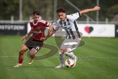Saison 2026/27 - Freundschaftsspiel - 1. FC Nürnberg - FC Ingolstadt 04 - Andrea Ceresoli (Nr.14 - FCN) - Dennis Kaygin (Nr.10 - FCI) - Foto: Meyer Jürgen