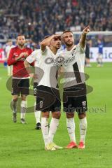 2.BL; FC Schalke 04 - FC Ingolstadt 04; Nassim Boujellab (8, FCI) Fatih Kaya (9, FCI) schauen zu den Fans