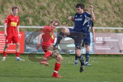 Kreisliga - Saison 2025/26- TSV Kösching - TV Münchsmünster - Sebastian Zabka rot Kösching - Dennis Fuchs blau Münchsmünster - Foto: Meyer Jürgen
