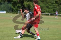 Testspiel - Bezirksliga - Saison 2025/26 - TSV Ober./Unterhaunstadt - Türkisch Ingolstadt  - Enis Kuqanaj rot Türkisch  - Firat Acar weiss Ober./Unterh.stadt - Foto: Meyer Jürgen