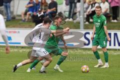 Landesliga - Saison 2024/25 - SV Manching - FC Kempten - Maximilian Eberwein (Nr.4 - SV Manching) - Alkan Ahmet weiss Kempten  #52 - Miroci Dugajin weiss Kempten  #14 - Foto: Meyer Jürgen