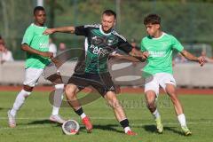Bezirksliga - Saison 2025/26 - FC Fatih Ingolstadt - TSV Gaimersheim - Thomas Schreiner (Nr.10 - TSV Gaimersheim) - Emre Berk grün Fatih - Foto: Meyer Jürgen
