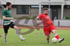 Bezirksliga - Saison 2022/2023 - FC Fatih Ingolstadt - VSST Günzelhofen - Roin Koblianidze rot Fatih  - Paul Fischer grün Günzelhofen - Foto: Meyer Jürgen