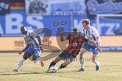 3. Liga; FC Hansa Rostock - FC Ingolstadt 04; Zweikampf Kampf um den Ball Marcel Costly (22, FCI) Ruschke Felix (29 HR) Kinsombi Christian (27 HR)