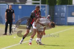 *** Bayernliga Nord - Saison 2025/26 - FC Ingolstadt 04 II - ATSV Erlangen - Micah Ham (Nr.25 - FC Ingolstadt II) - Lukas Kuschka weiss Erlangen - Foto: Meyer Jürgen