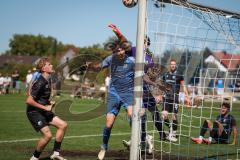 Kreisliga - Saison 2026/27 - SV Hundszell - SV Menning - Lukas Conradi blau Hundszell - Marc Zimmer TW Menning - Foto: Meyer Jürgen
