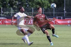 3. Liga; Testspiel; FC Ingolstadt 04 - FC Heidenheim; Zweikampf Kampf um den Ball Arian Llugiqi (25, FCI) Traoré Omar Haktab (FCH)