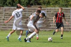 *** Bayernliga Nord - Saison 2025/26 - FC Ingolstadt 04 II - ATSV Erlangen - Ognjen Draculic (Nr.9 - FC Ingolstadt II) - Thomas Müller weiss Erlangen - Burak Ayvaz weiss Erlangen - Foto: Meyer Jürgen