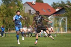 Kreisliga - Saison 2026/27 - SV Hundszell - SV Menning - Christoph Handl blau Hundszell - Noah Kamenjasevic schwarz Menning  - Foto: Meyer Jürgen
