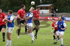 Kreisklasse -  Saison 2023/2024 - DJK Ingolstadt - FC Tegernbach - Alexander Reif blau DJK Ing. - Korbian Lörz rot Tegernbach rechts kopfball - Foto: Meyer Jürgen