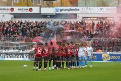 3.Liga - Saison 2022/2023 - TSV 1860 München - FC Ingolstadt 04 - Die Mannschaften auf dem Spielfeld - Bengalisches feuer - Raketen - Foto: Meyer Jürgen