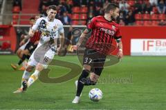 3.Liga - Saison 2022/2023 - FC Ingolstadt 04 -  Dynamo Dresden - Pascal Testroet (Nr.37 - FCI) - Robin Tim Becker (Nr.16 - Dresden) - Foto: Meyer Jürgen