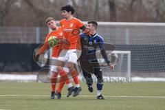 Schanzer Amateurcup 2026 - SV Haunwöhr - SC Irgertsheim - Mathias Bausch orange Irgertsheim - Ibo Miller blau Haunwöhr - Foto: Meyer Jürgen