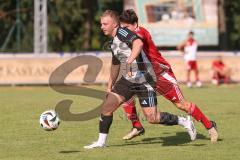 Testspiel - Bezirksliga - Saison 2025/26 - TSV Ober./Unterhaunstadt - Türkisch Ingolstadt  - Baha Asici rot Türkisch  - Florian Diegel weiss Ober./Unterh.stadt - Foto: Meyer Jürgen
