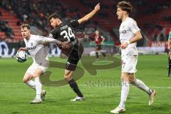 3. Liga; FC Ingolstadt 04 - SC Freiburg II; Lukas Fröde (34, FCI) Rüdlin Fabian (5 SCF) Zweikampf Kampf um den Ball