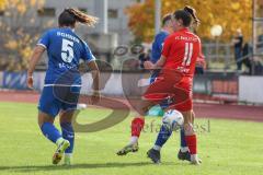 2. Fußball-Liga - Frauen - Saison 2022/2023 - FC Ingolstadt 04 - SC Sand - Vidovic Paula (Nr.11 - FC Ingolstadt 04 ) - Bohnen Amelie blau SC Sand - Foto: Meyer Jürgen
