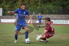 A-Klasse -  Saison 2026/27 - DJK Ingolstadt - TSV Mailing/Feldkirchen - Markus Käser blau DJK Ingolstadt  - Marco Ernhofer TW Mailing hält den Ball - Foto: Meyer Jürgen