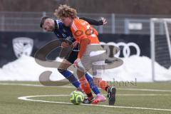 Schanzer Amateurcup 2026 - SV Haunwöhr - SC Irgertsheim - Patrick Mack blau Haunwöhr - Benedikt Klotzbücher orange Irgertsheim - Foto: Meyer Jürgen