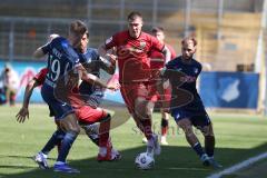 3. Liga - Saison 2025/26 - TSG Hoffenheim II - FC Ingolstadt 04  - Jonas Scholz (Nr.15 - FCI) - Natnael Abraha (Nr.13 - TSG Hoffenheim II) - Foto: Meyer Jürgen