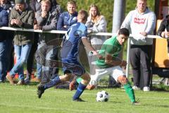 2023_10_28 - Kreisliga - Saison 2023/24 - SV Menning - FC Gerolfing  - Ananstasios Porfyriadis grün Gerolfing - Hermann Zagler blau Menning - Foto: Meyer Jürgen