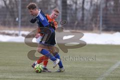 Schanzer Amateurcup 2026 - SV Haunwöhr - SC Irgertsheim - Marc Schuhmann orange Irgertsheim - Noah Koller blau Haunwöhr - Foto: Meyer Jürgen