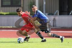 Testspiel - Bezirksliga - Saison 2025/26 - FC Fatih Ingolstadt - TSV Burgheim - Aaron Toski rot Fatih - Florin Horoba blau Burgheim - Foto: Meyer Jürgen