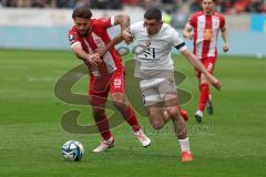 3. Liga - Saison 2023/24 - Rot-Weiss Essen - FC Ingolstadt 04 -  - Jose Enrique Rios Alonso (#23 Essen) - Draculic Ognjen (Nr.30 - FCI) - Foto: Meyer Jürgen